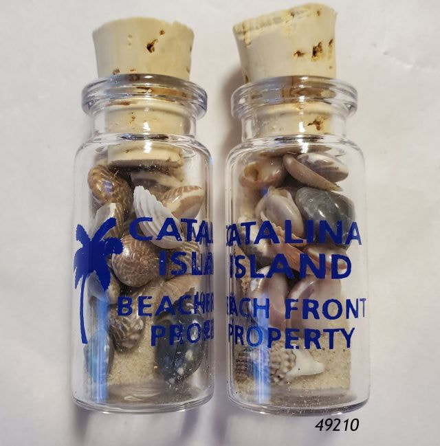 49210 Miniature glass bottles with sand, shells and inscribed Catalina Island Beachfront Property.  Souvenir item.  72-ct display