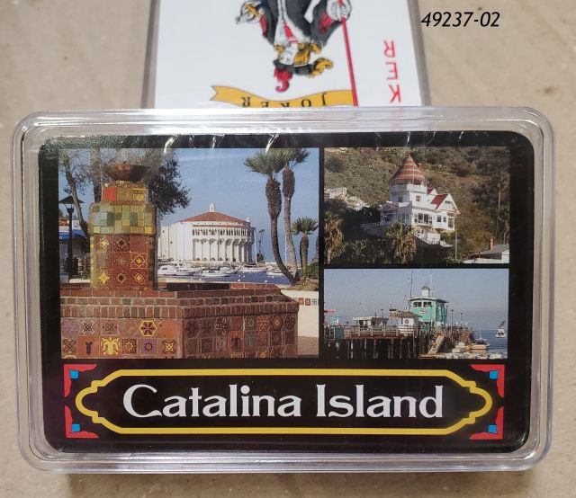 49237-01  Catalina Island playing cards decks in clear plastic box.   Montage of pictures. 