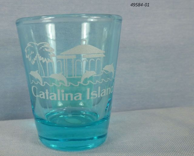 49584-01 blue shotglass with souvenir Catalina Island Casino dolphins design. 