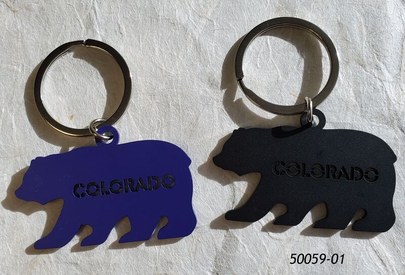 Colorado Souvenir keyring in shape of bear with cutout lettering.   Assorted blue and black colors.  Item 50059-01