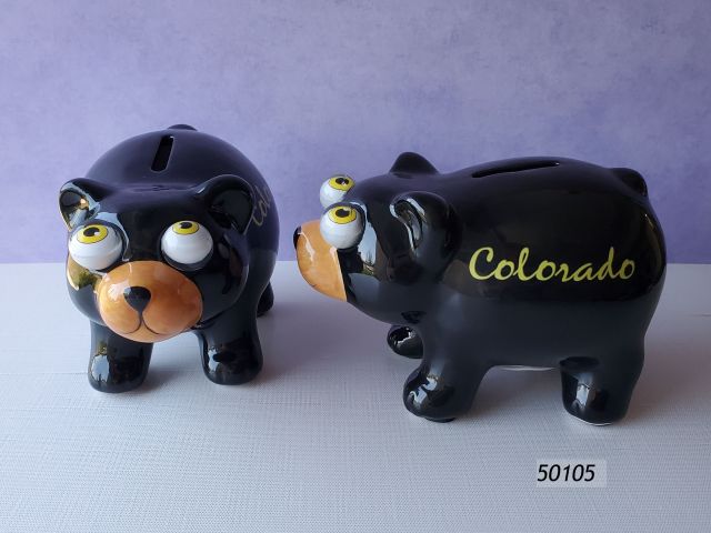 50105 Colorado Souvenir Ceramic Bank shaped like a comic black bear.  Eyeballs are roly-poly plastic and always face up.  Packed in boxes of 4 pc. 