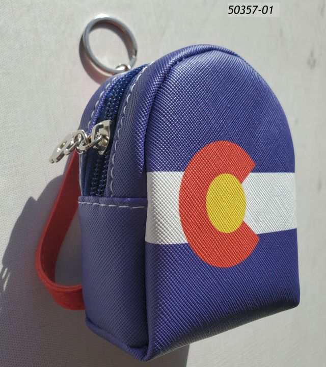50357-01 Colorado Souvenir Backpack Keyring, approximately 4" tall with a Colorado Flag design. Zip pouch.  