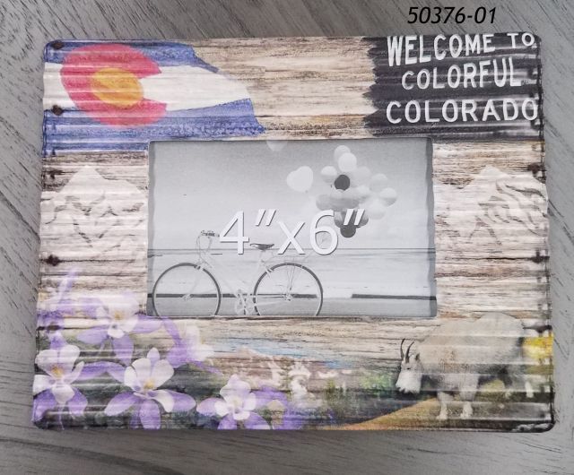50376  Rippled Metal photo frame with Colorado Souvenir Designs:  flag, columbine flowers, welcome sign, mountains, mountain goat.  
