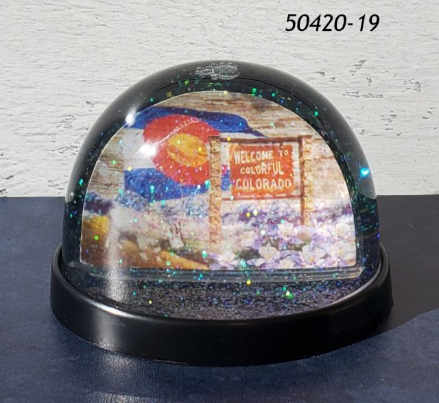 50420-19 Colorado Souvenir plastic snowdome with image of Colorado Flag, Welcome to Colorful Colorado Sign, Mountain Goat and Columbine flowers.  