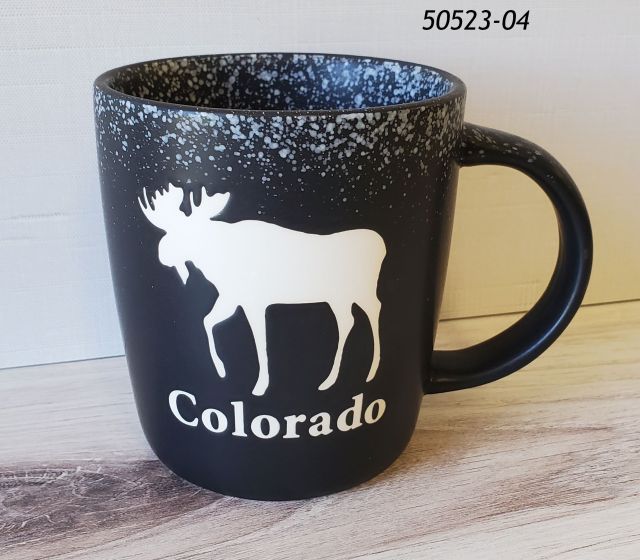 Colorado Souvenir Mug, 14 oz, black matte finish with speckle trim, like snowflakes and a Moose direct print design.  Item number 50523-04