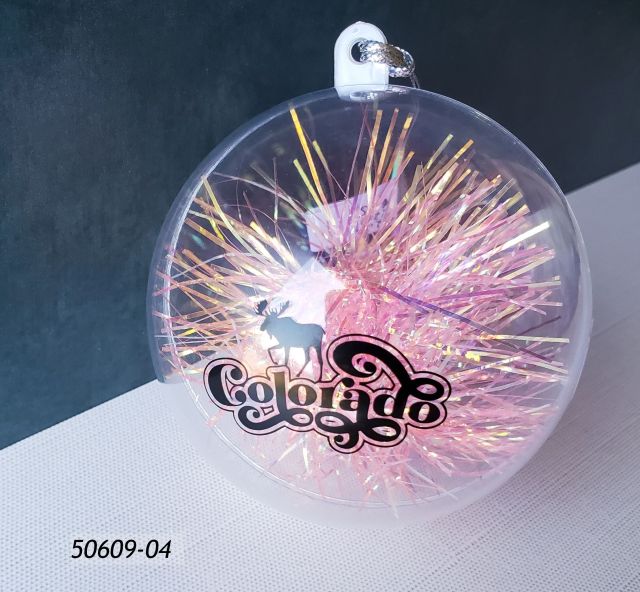 50609-04 Colorado Souvenir Ornament.  Round Plastic Globe with pink/gold tinsel inside and a Colorado Moose design printed in black on the outside. 