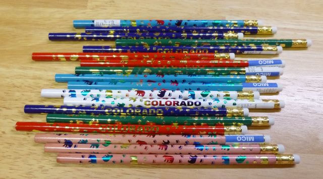 Colorado souvenir pencil with bear and bear paw design in shiny foil.  Assorted colors.  Assortment may vary.  