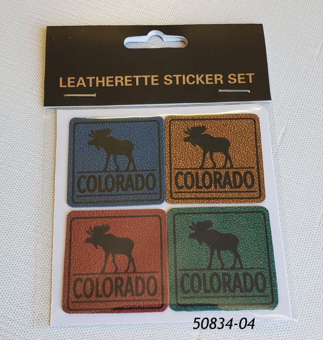 50834-04 Colorado Leatherette Sticker set.  Card of four stickers (different colors) with a black moose imprint.  Poly bag w header for hanging.  