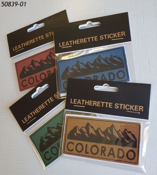 50839-01 Colorado Souvenir Stickers, leatherette material with printed mountain graphic. Four assorted colors, each in poly bag w header card. 