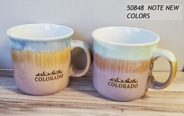 Colorado Camper style mug w Reactive glaze Southwest colors and mountain decal design. 2 assorted colors. 