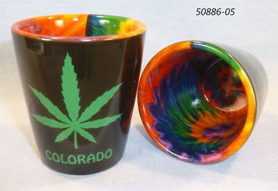 Souvenir black ceramic shotglass with Tie Dye Liner.   Colorado Pot Leaf Design