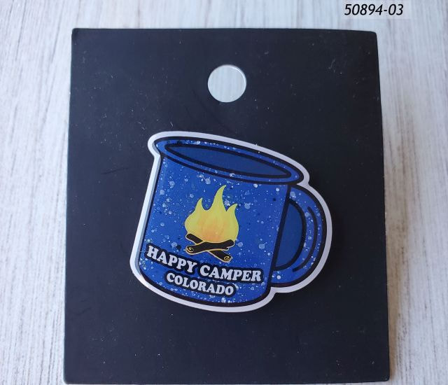 50894-03 Colorado Souvenir Pin shaped like a coffee cup with blue speckle design and a campfire that reads:  Happy Camper Colorado